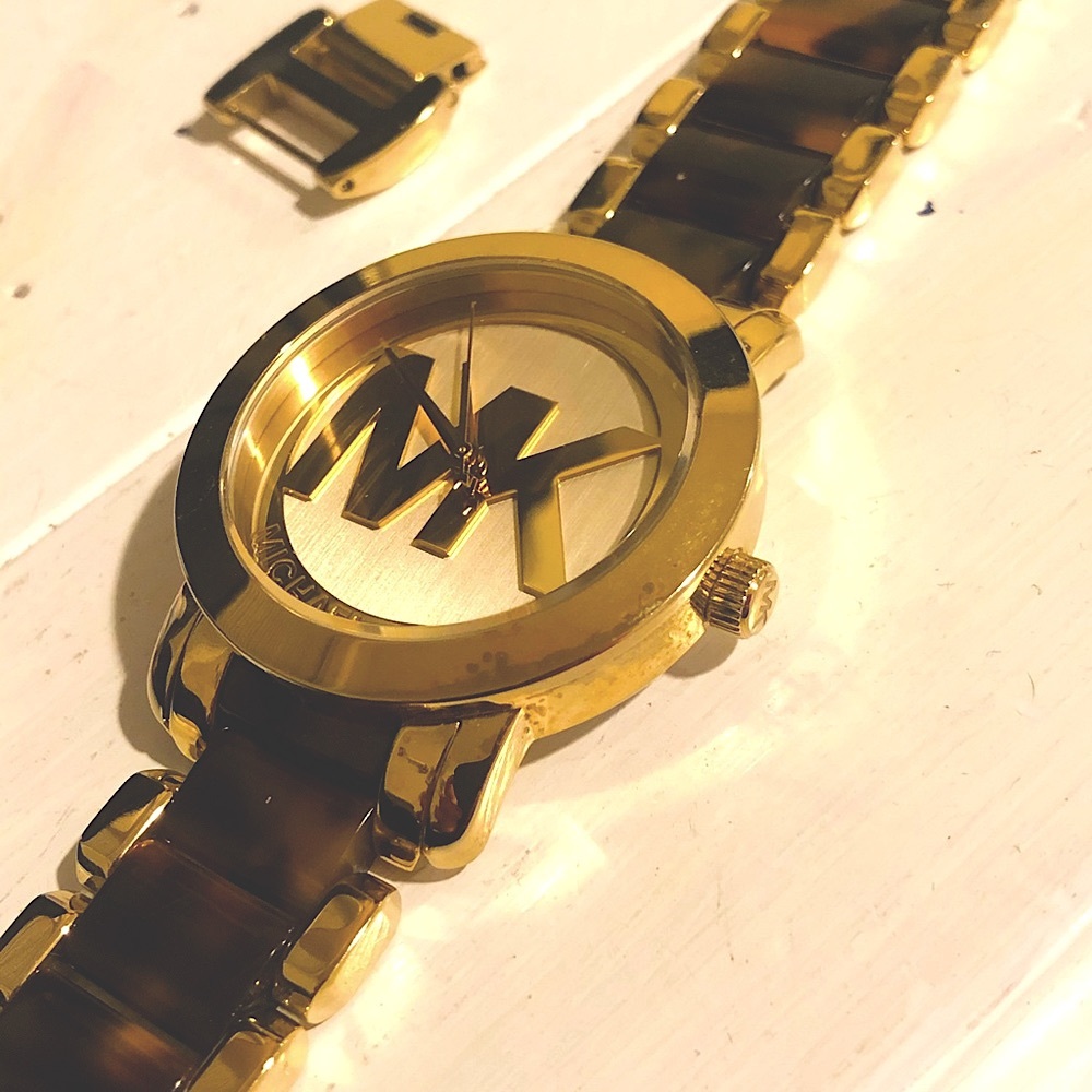 Michael Kors tortoise and gold logo face women’s watch
